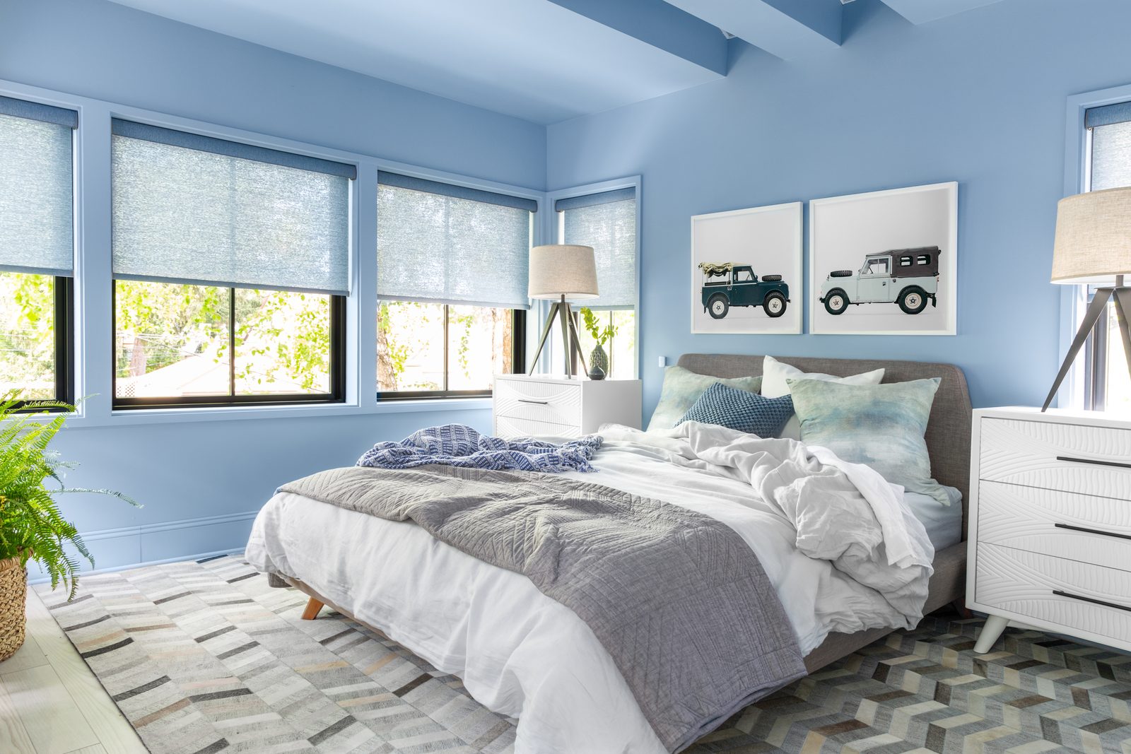 Editorial wide-angle interior photograph of a master bedroom — the kind of current-portfolio image a rolling refresh keeps near the top of the rotation.
