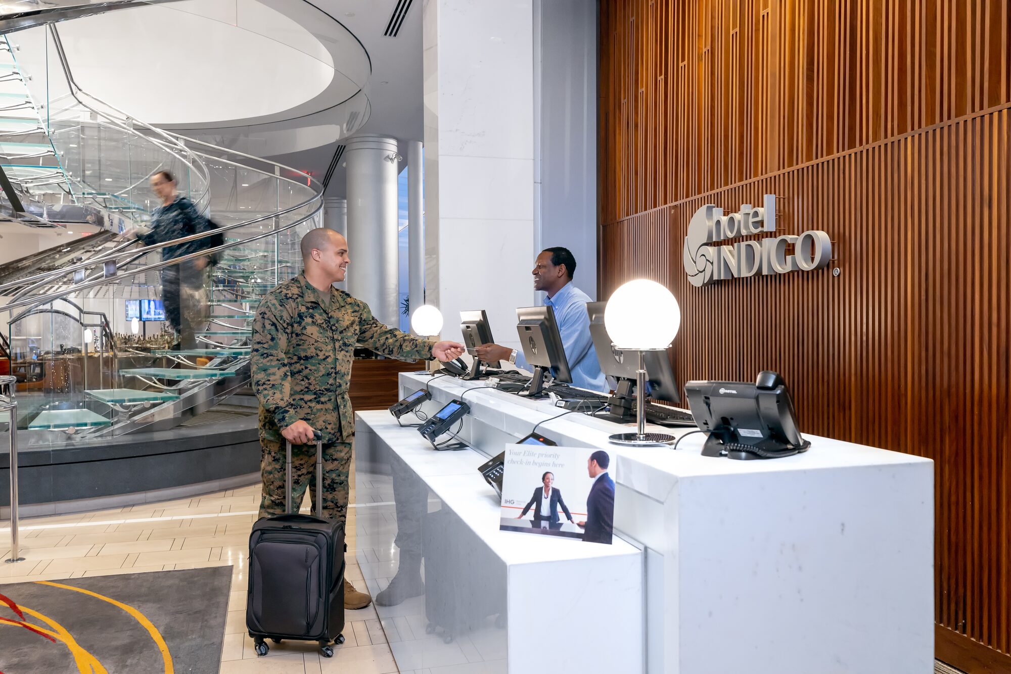 Hotel Indigo front desk check-in — guest experience photography